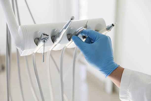 Professional Tooth Extraction technician working in Herndon, VA